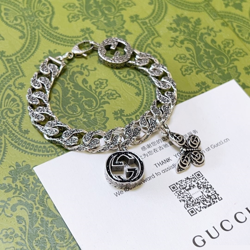 G*u*i bracelets